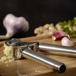Hvitløkspresse stål 20 cm