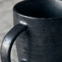 Pion krus 38 cl svart/brun